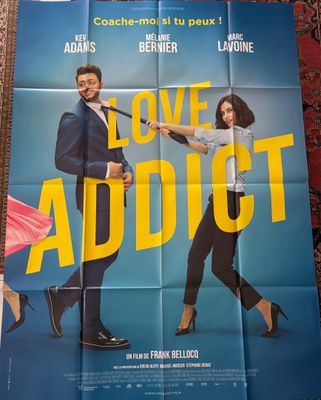 une affiche de film représentant un homme et une femme tenant une batte de baseball