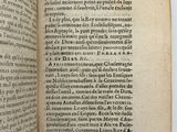 an open book with a black and white image of a man ' s face on it