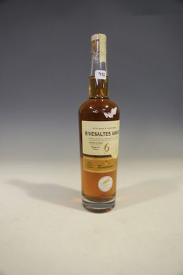 an image of a bottle of whisky sitting on a table