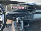 the interior of a car with a steering wheel and dashboard controls