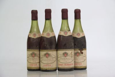 three bottles of wine sitting next to each other on top of a table