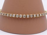 Bracelet tennis en or jaune 14 carats serti de diamants