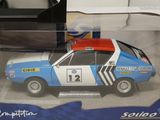 a toy car that is in the box on the table
