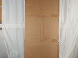 a large cardboard box sitting on top of a bed