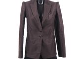 a woman ' s brown jacket on a mannequin mannequin mannequin mannequin mannequin mannequin mannequin mannequin