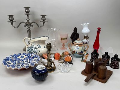 many different types of vases and other items on the table