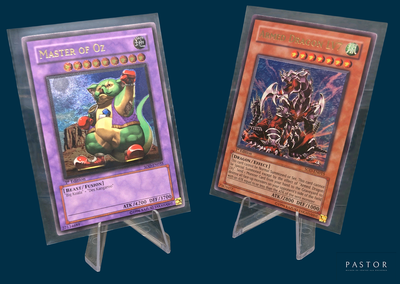 two cards that are on display on a stand