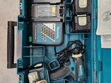 a blue box with tools in it on the floor