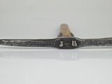an image of a pair of scissors on a white surface