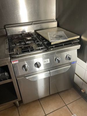 a stainless steel stove and oven in a kitchen