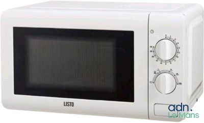 une image d'un four à micro-ondes blanc sur fond blanc