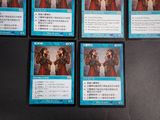 six cards of the card game are sitting on a table