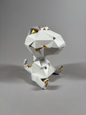 a paper sculpture of a dog that is sitting on the ground