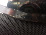 a close up of a pair of scissors on top of a table