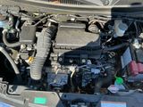 a picture of a car engine with its hood open