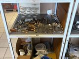 a cart with many items on it in a room