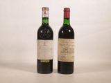 deux bouteilles de vin posées l'une à côté de l'autre sur une table