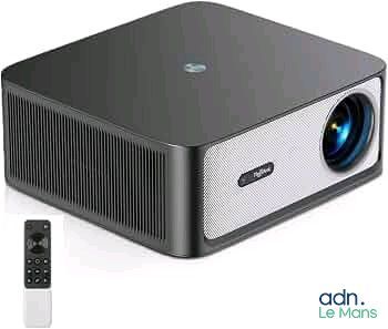 an image of a projector with a remote and a remote control