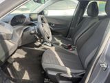 the interior of a car with the front seats folded down