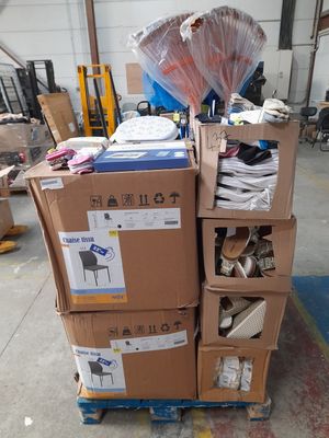 a stack of boxes with bags on top of them