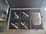 a metal case that has a bunch of items inside of it