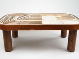 a coffee table that has a design on the top of it