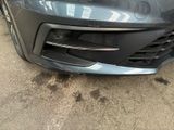 a close up of the front bumper of a car