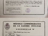 two certificates with a picture of a man in a suit and tie