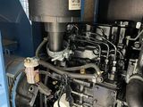 an image of a large engine in a blue room