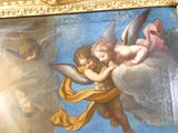 une photo d'un tableau représentant deux anges sur un nuage