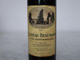 a bottle of wine that is sitting on a table