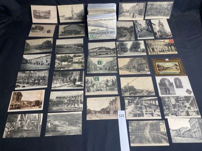 many old postcards of different types and sizes are on a table