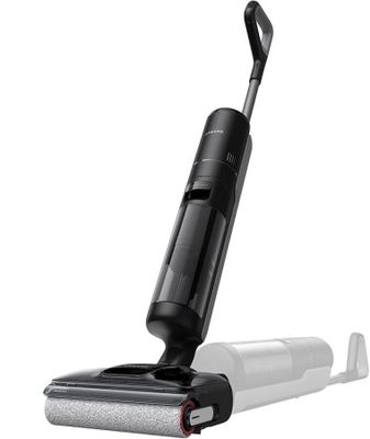 gros plan d'un aspirateur noir et argent sur fond blanc