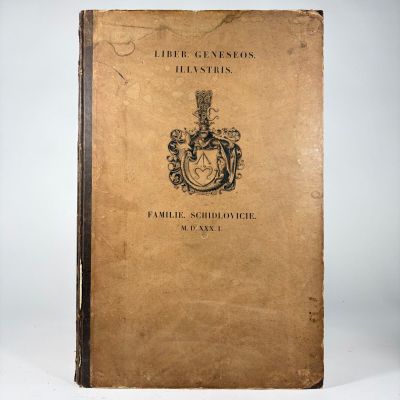 an old book with a picture of a coat of arms on it