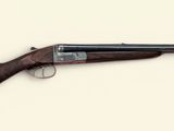 a close up of a rifle on a white background