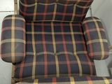 an image of a chair with a plaid upholstered seat