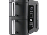 an image of a black and silver microwave oven