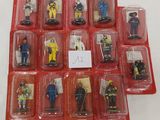a lot of action figures that are in the package