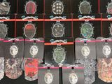 a lot of bracelets on display on a black table