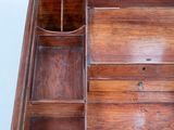 a small wooden box with a mirror in it