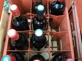 plusieurs bouteilles de vin dans un coffret en bois