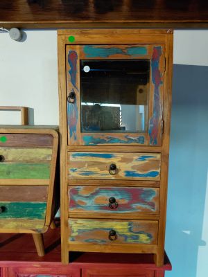two wooden drawers and a cabinet with a mirror on top of it