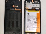 a picture of a cell phone with a battery attached to it