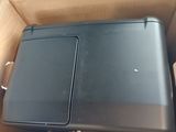 a box that has two laptops inside of it