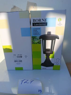 a box with a lamp on it sitting on a table