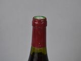 a bottle of wine that is sitting on a table