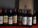 several bottles of wine are lined up on a table
