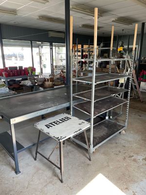 a large room with a lot of shelves and tables