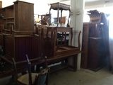 a lot of furniture that is sitting in a room
