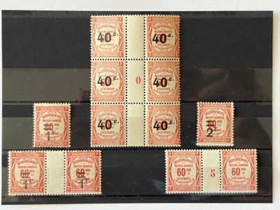une image représentant une photo d'une série de timbres sur lesquels figurent des chiffres